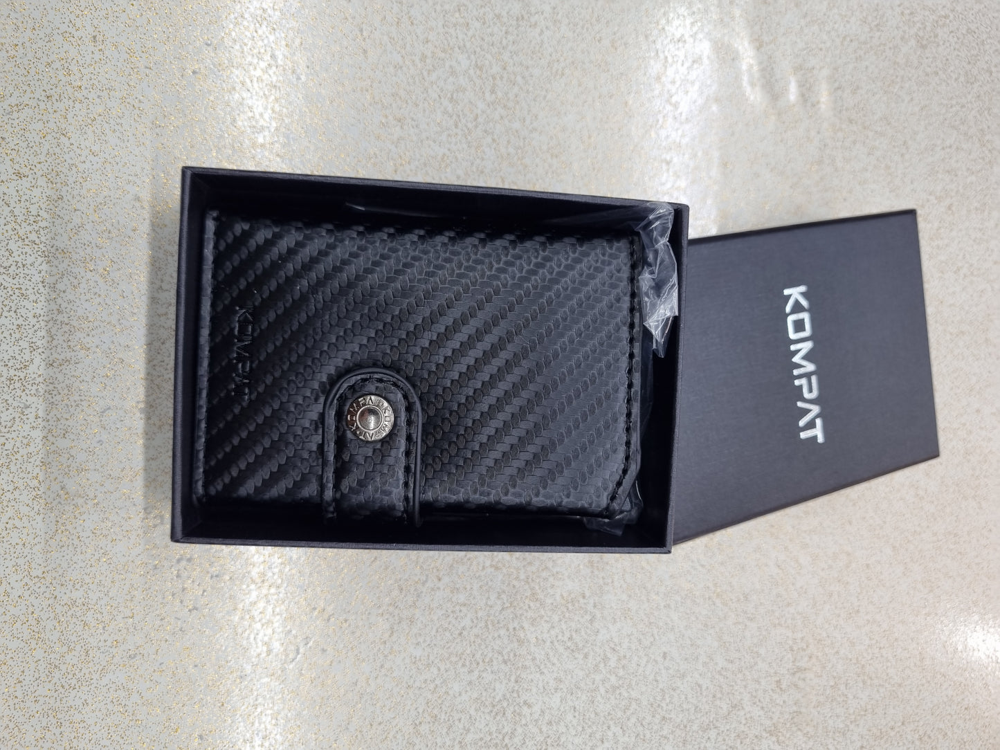 Porta carte kompat