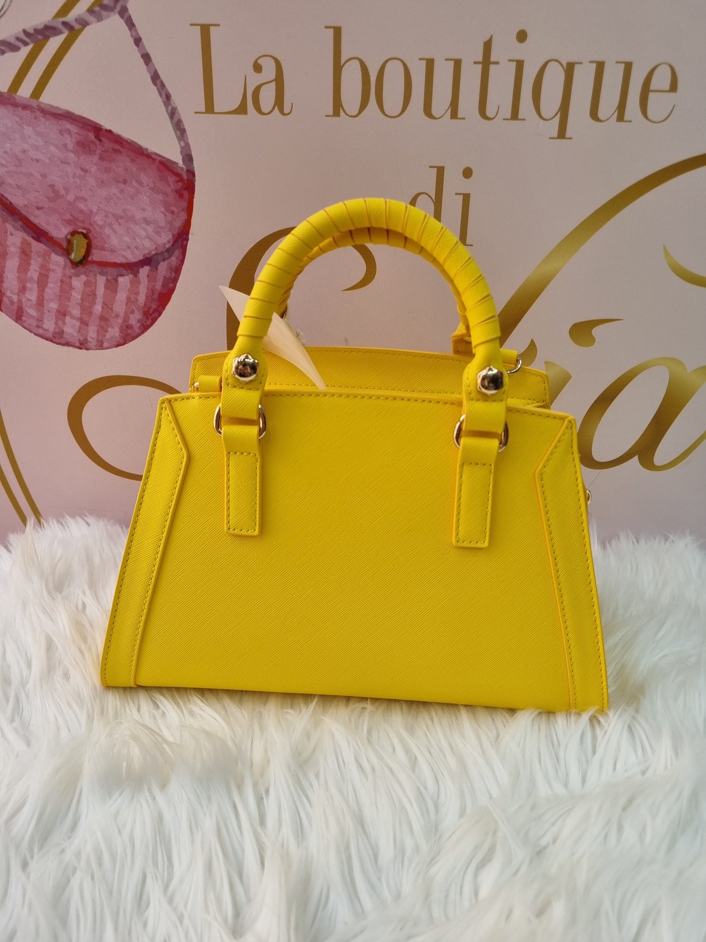 Bauletto a mano e tracolla regolabile