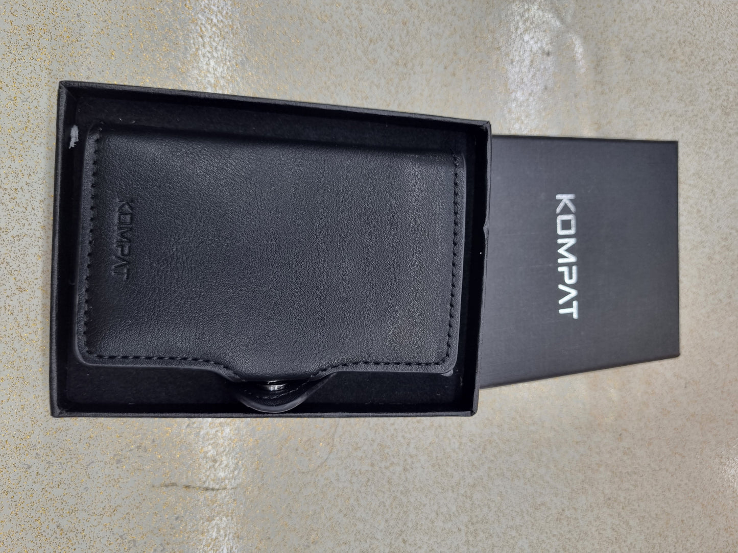Porta carte kompat
