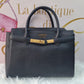 Borsa a bauletto a mano e tracolla