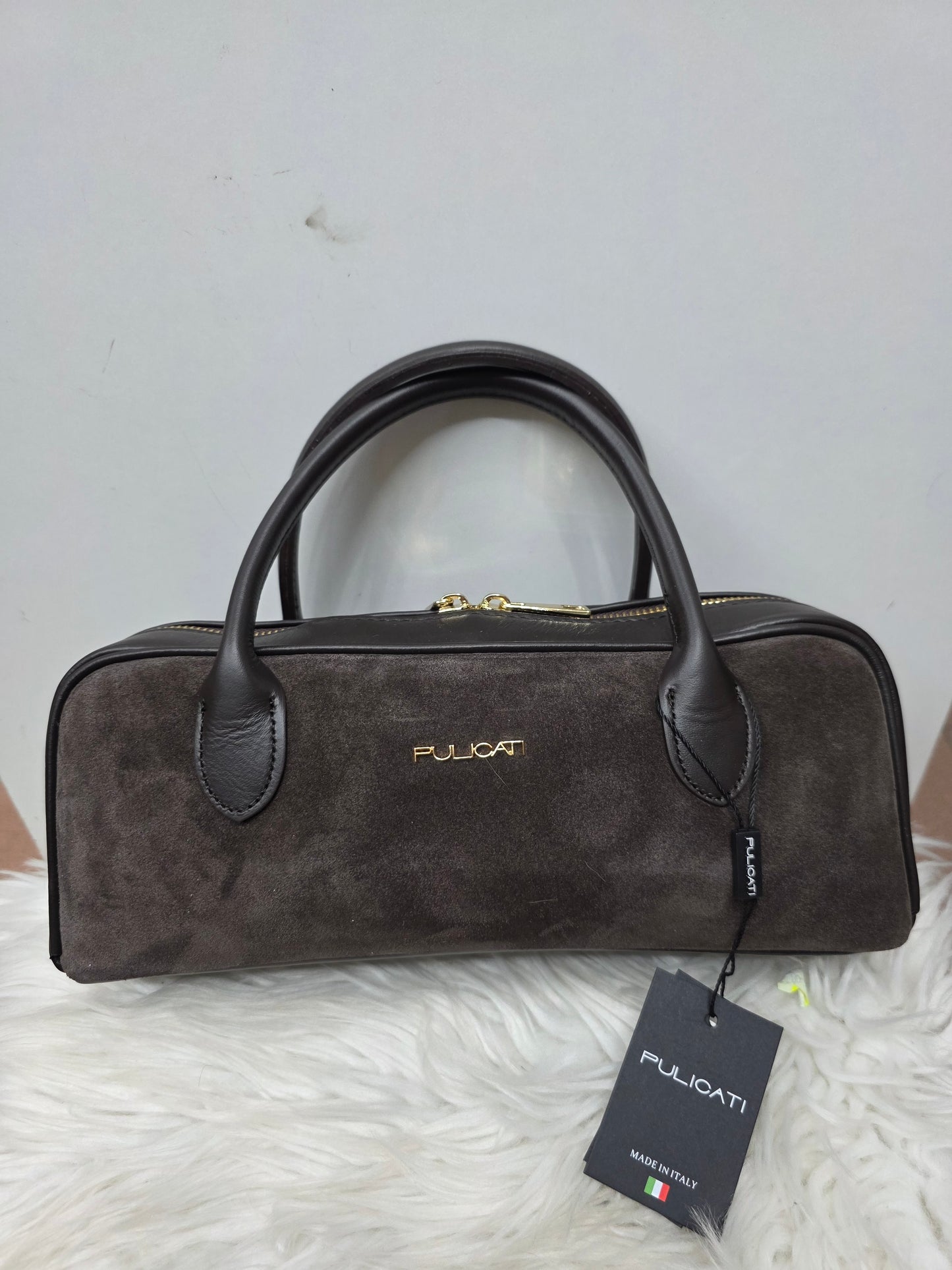 Pulicati bauletto camoscio e pelle