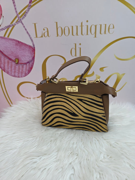 Borsa in pelle.e cavallino